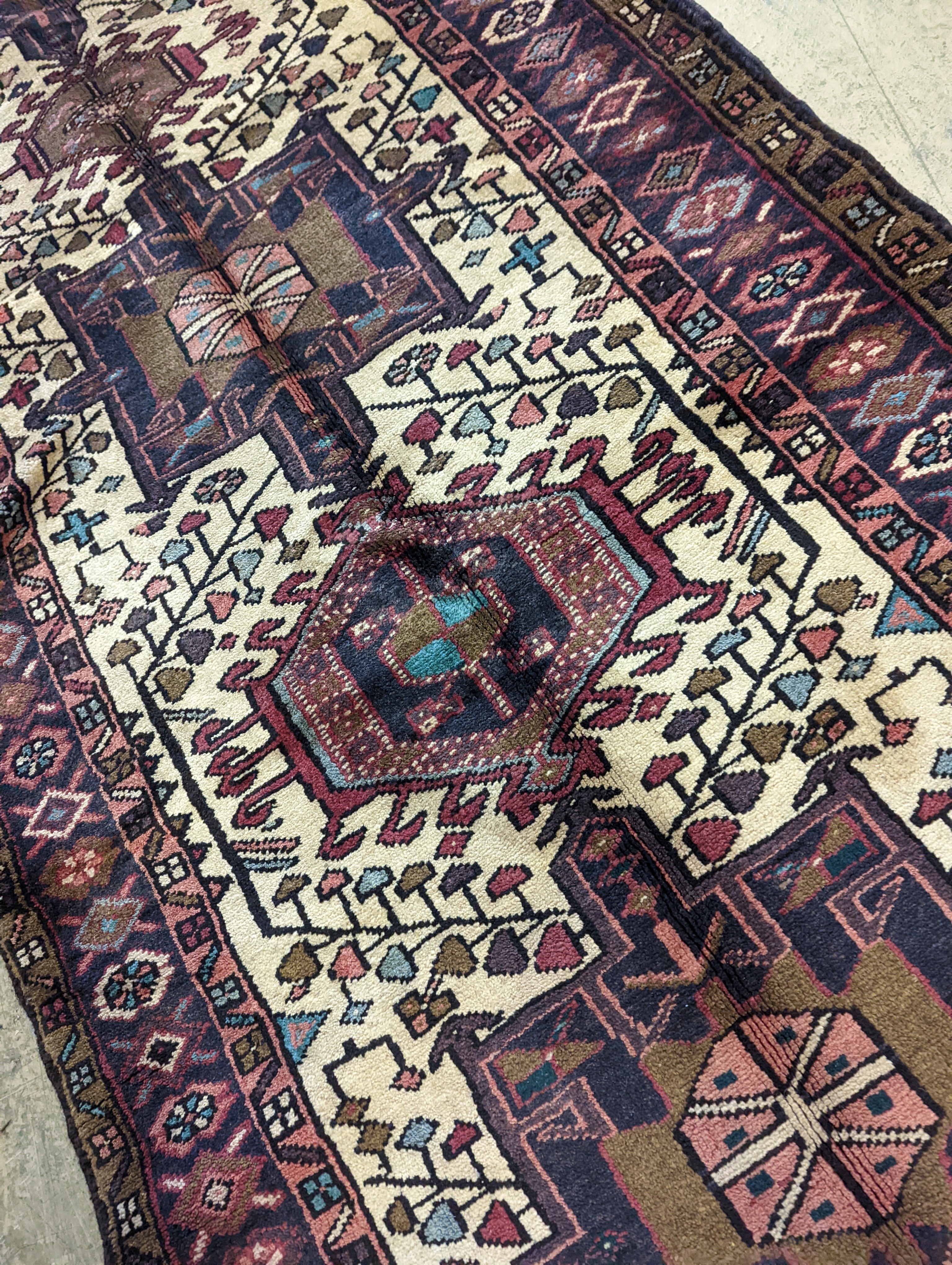 A Karajeh hall carpet, 320 x 106cm